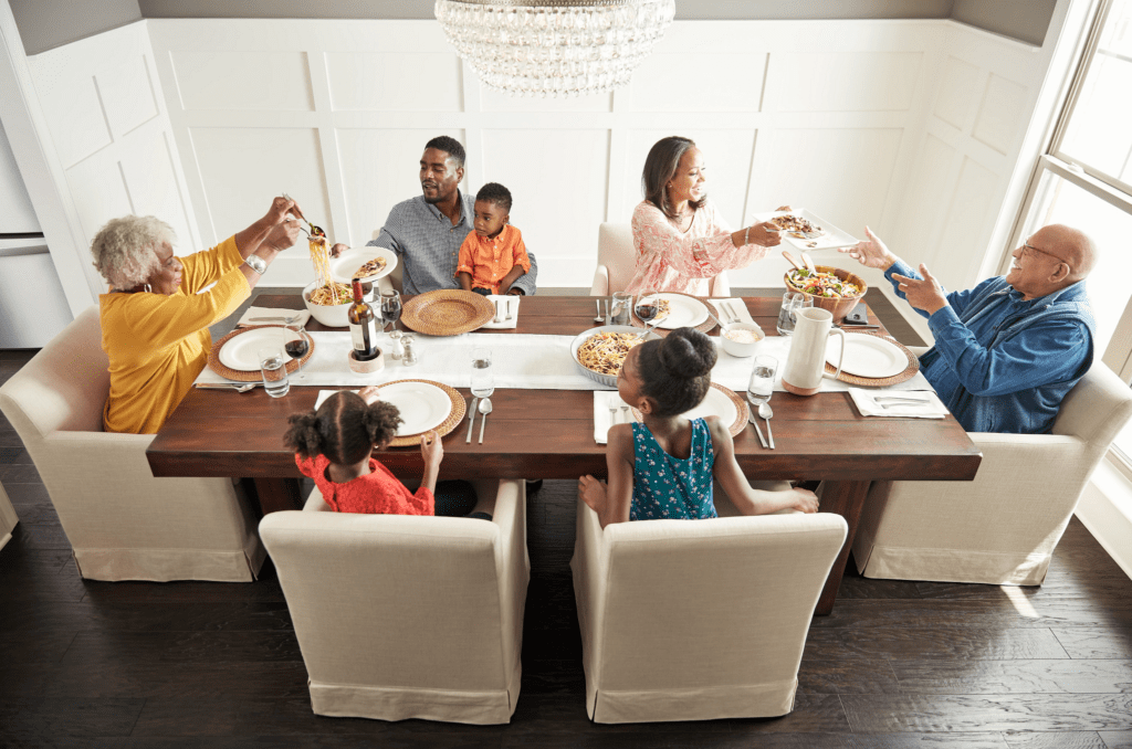 Family having breakfast at the dining table | PDJ Flooring